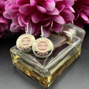 Chanel Pink button earrings