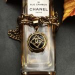 "Eloise" Vintage Chanel Black Gold Button Pendant - Image 2