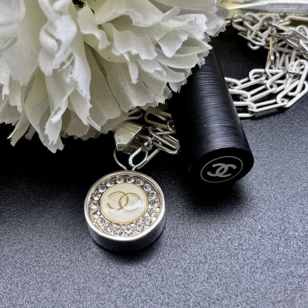 Chanel button pendant Chanel buttons Chanel button pendant Chanel and diamonds repurposed Chanel Upcycled Chanel Designer button jewelry Designer button jewellery