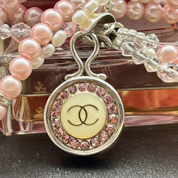Chanel pink diamond buttons Chanel button jewellery Chanel button jewelry Chanel button pendant