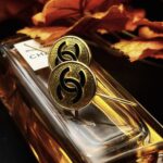 "Fleur" Vintage Chanel Black Gold Button Earrings - Image 2