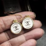 Authentic Chanel couture buttons transformed into one of a kind jewellery