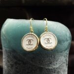 Authentic Chanel couture buttons transformed into one of a kind jewellery