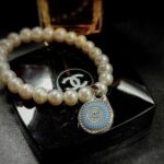 Vintage Chanel Button Charm Pearl Bracelet