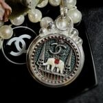 Vintage Chanel Elephant Button Pendant