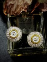 Vintage White Chanel Domed Button Clip On Earrings