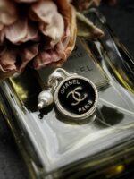 Antique 1920s Chanel Button Charm Pendant