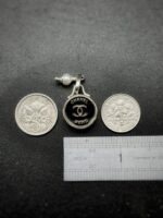 Antique 1920s Chanel Button Charm Pendant